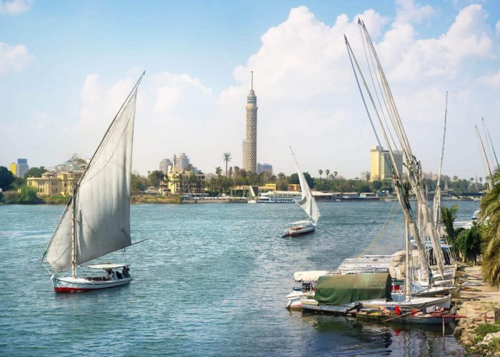 a-snapshot-of-the-felucca-in-cairo-at-the-nile-river-with-the-cairo-tower